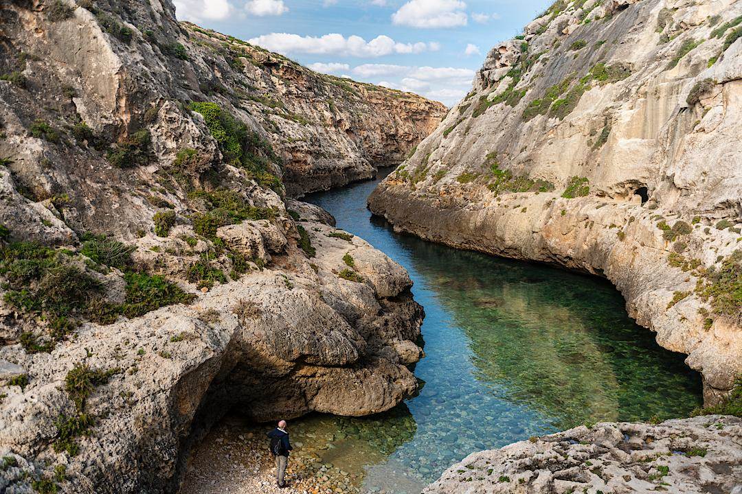 Person hiking in Gozo, Malta.