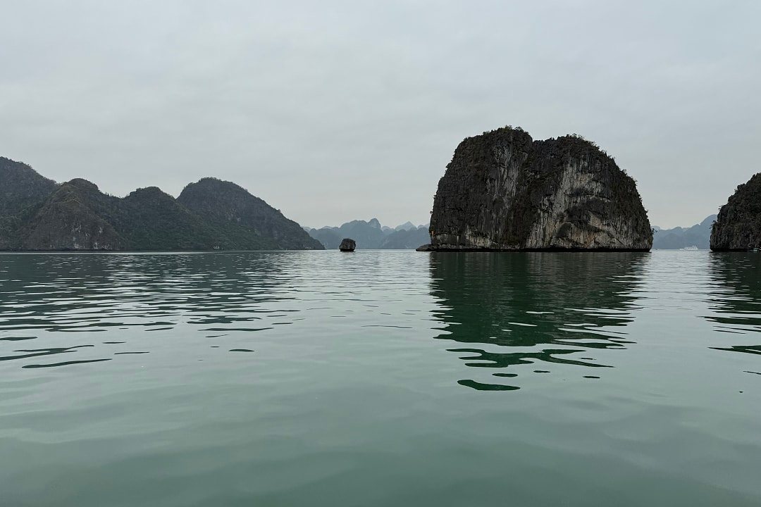 Limestone karsts rising from the waters of Ha Long Bay