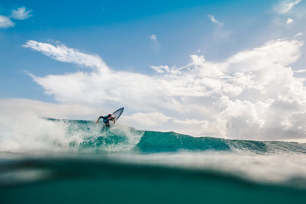 Surfer catching a wave