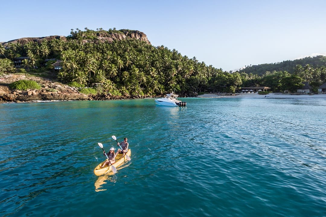 Couple on an adventure enjoying kayaking. 