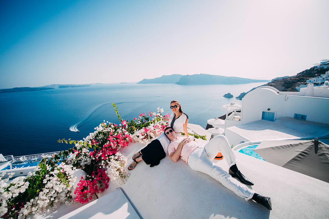 Couple in Santorini Island, Greece.