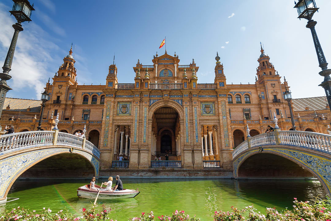 Family at the Plaza de Espana in Seville, Spain