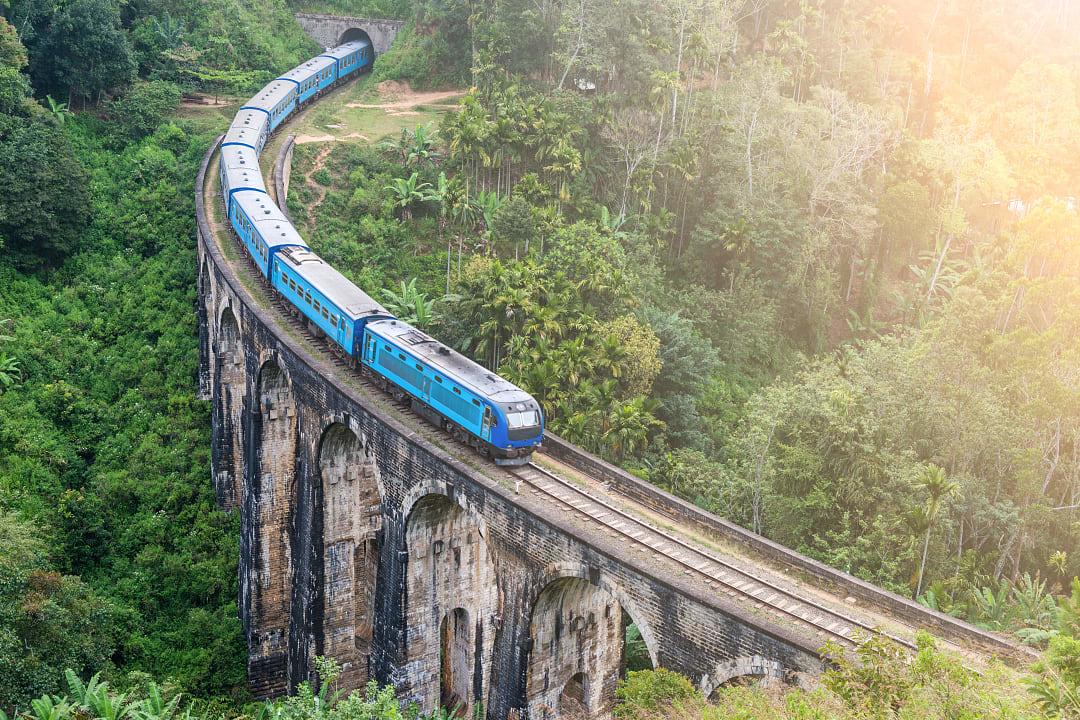 Blue train on Nine Arch Bridge, Sri Lanka