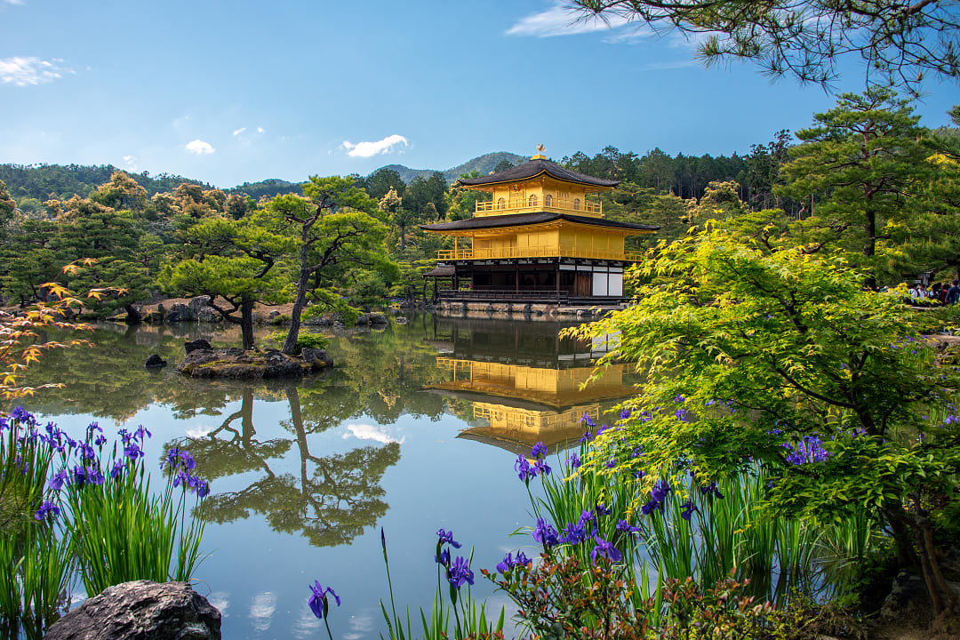 Kinkakuji temple and Kyōko-chi Pond surrounded by gardens in Kyoto, Japan