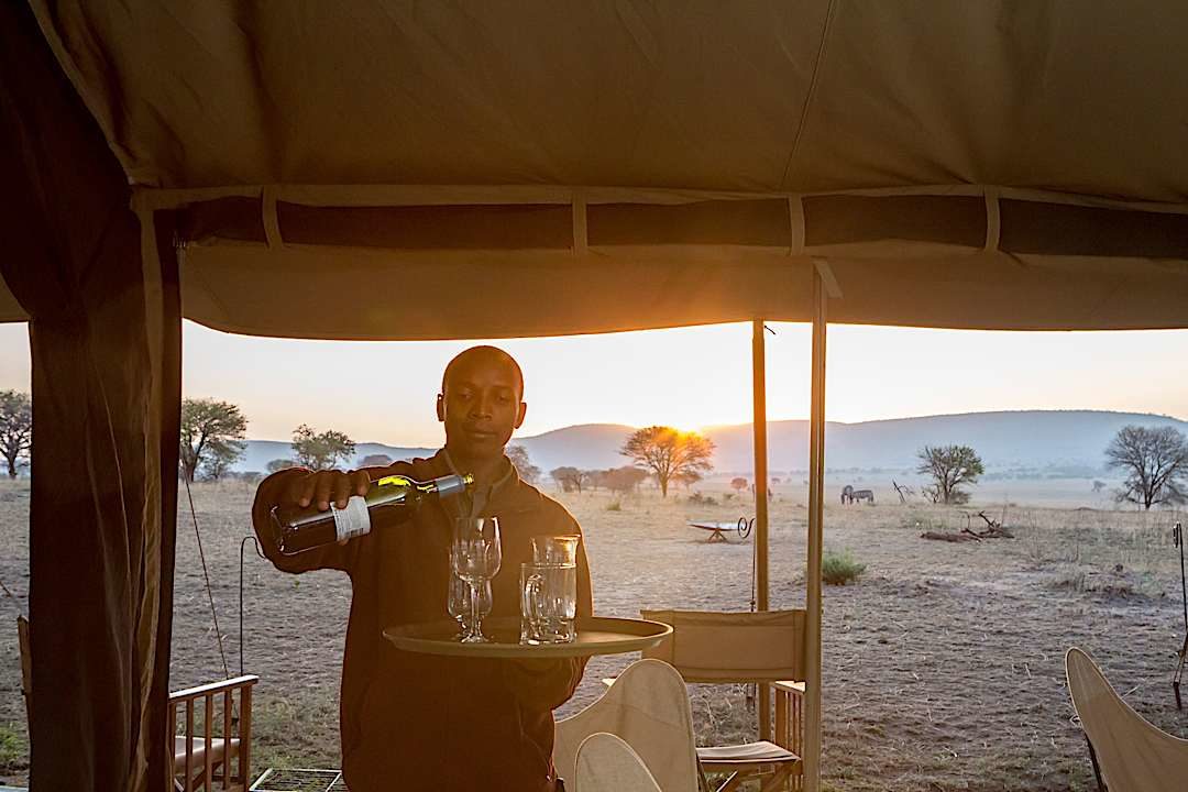 Golden hour hospitality on the edge of the Serengeti.