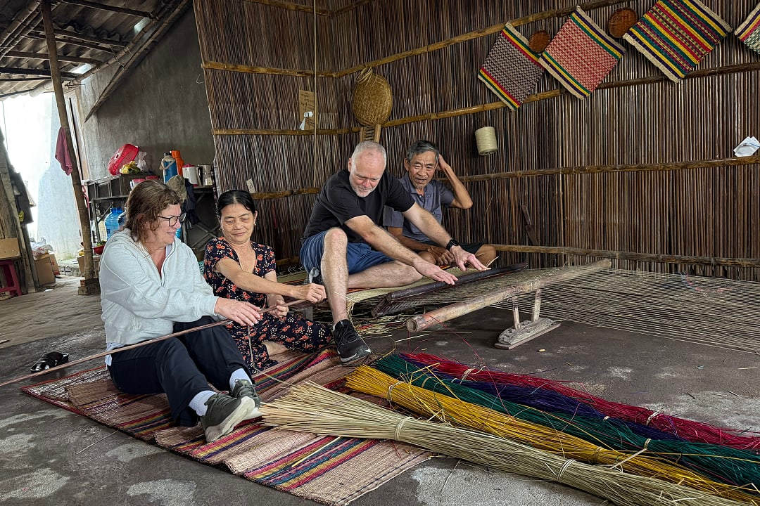 Zicasso travelers Visitors learning traditional mat weaving with local artisans near Huế, Vietnam