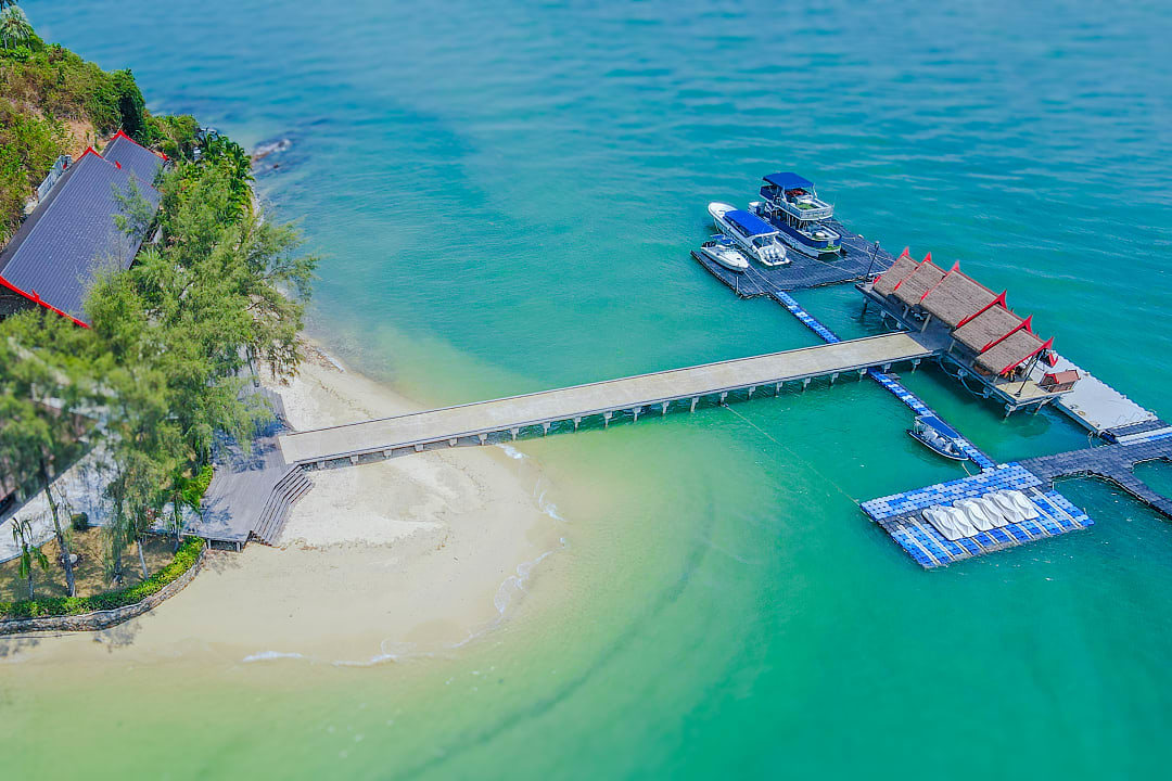 Koh Rang Noi, a private island near Phuket, boasts turquoise waters and bespoke services.