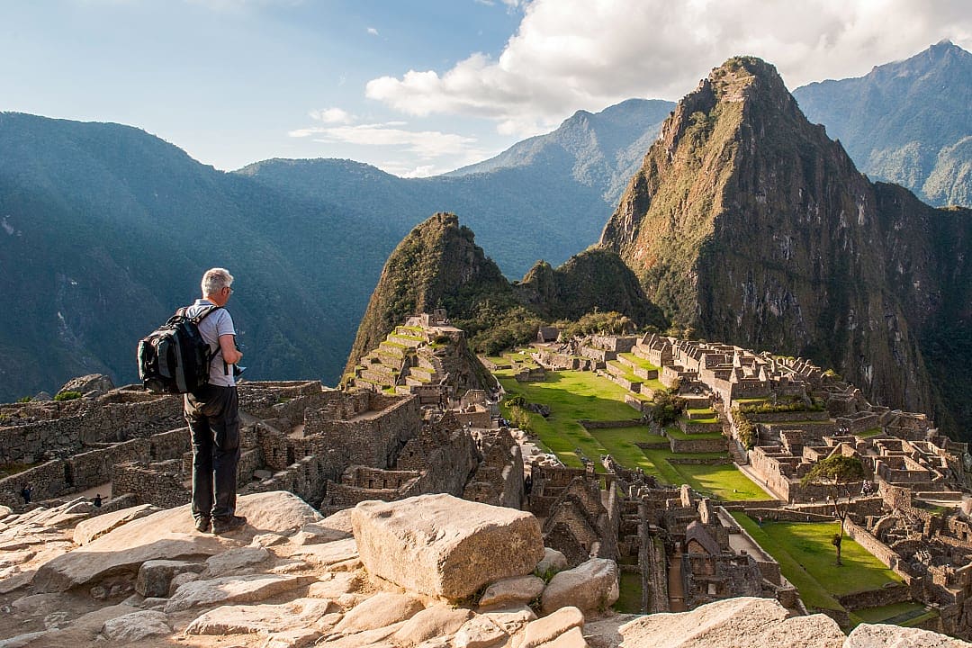 Senior traveler at Machu Picchu in Peru