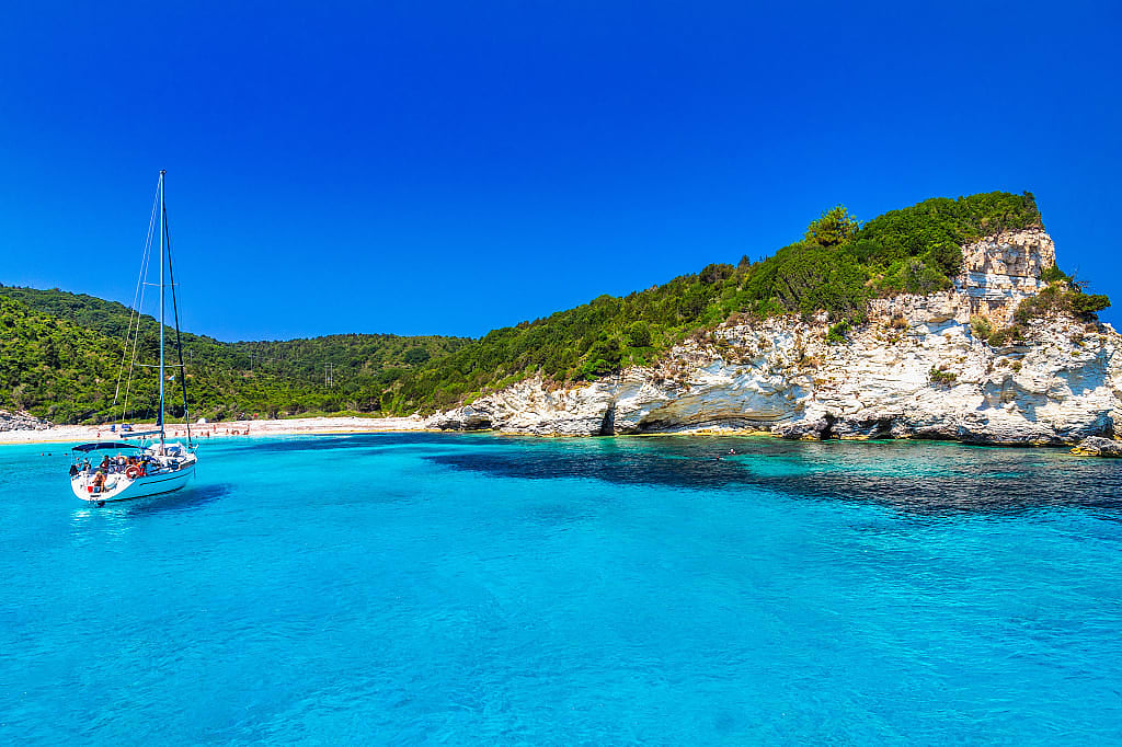 Turquoise coast of Antipaxos island with Voutoumi beach in Greece.