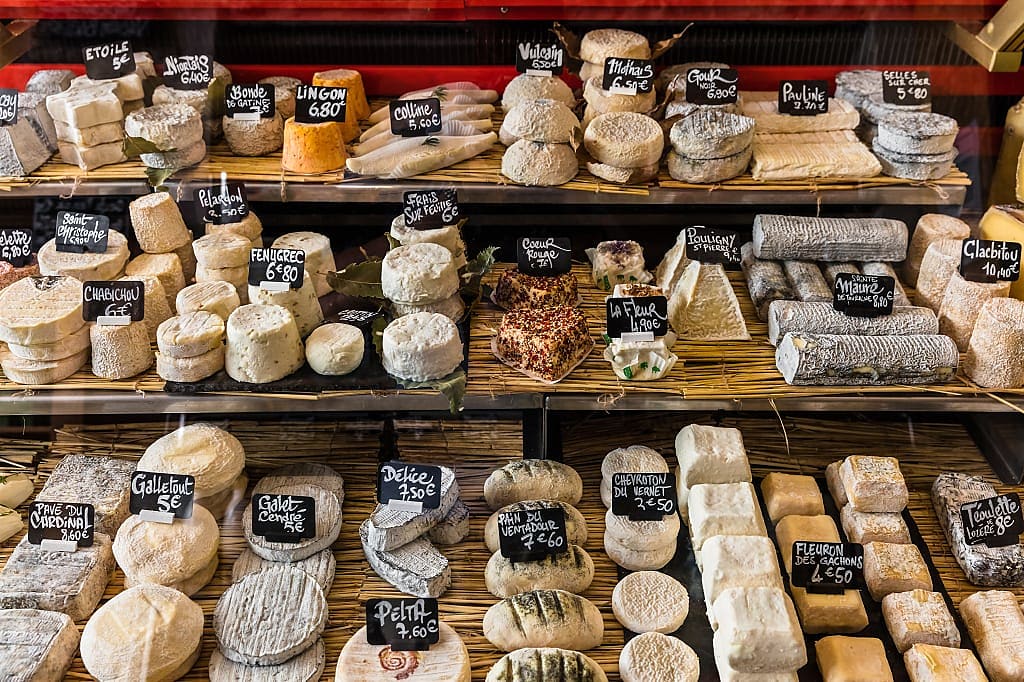 Selection of cheeses in Aligre Market, Paris