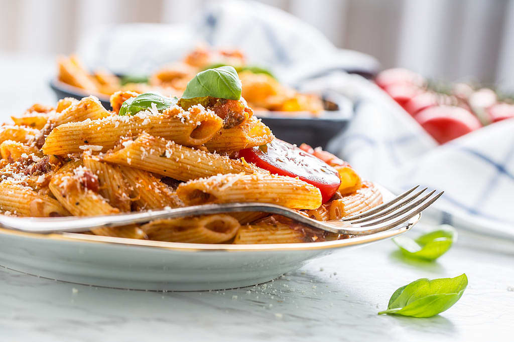  Pasta pene with bolognese sauce