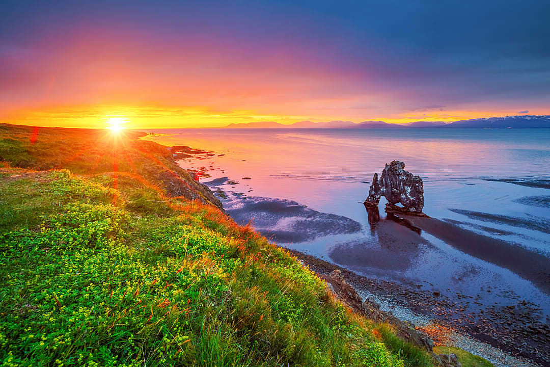 Tranquil morning sunrise over Húnaflói Bay with Hvitserkur rock on the Vatnsnes Peninsula in Iceland