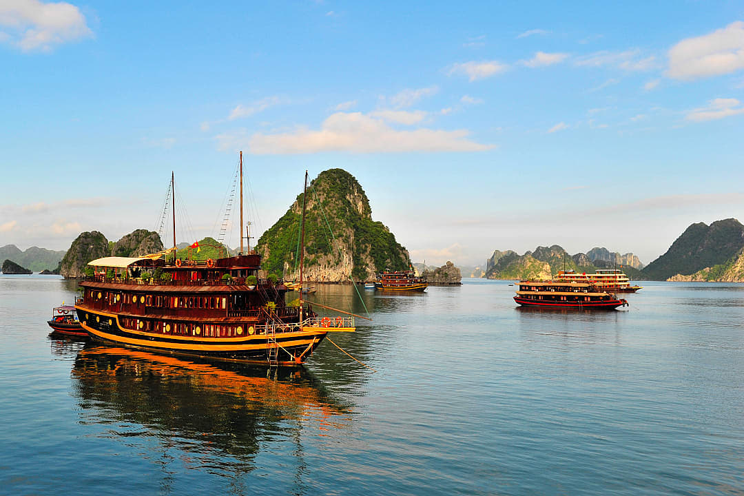 Tourist junks sailing in Ha Long Bay.