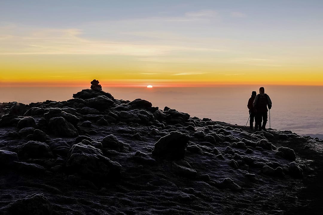 Hikers enjoying the views from the Uhuru Peak.