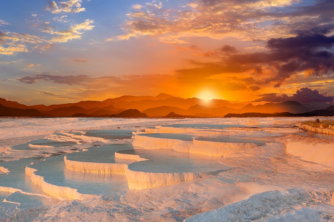 Beautiful sunrise at the Travertine pools and terraces in Turkey