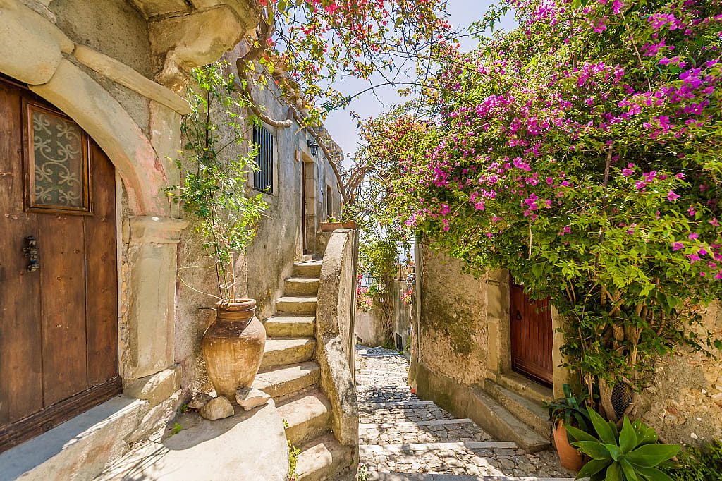 Narrow old town street in Sicily, Italy
