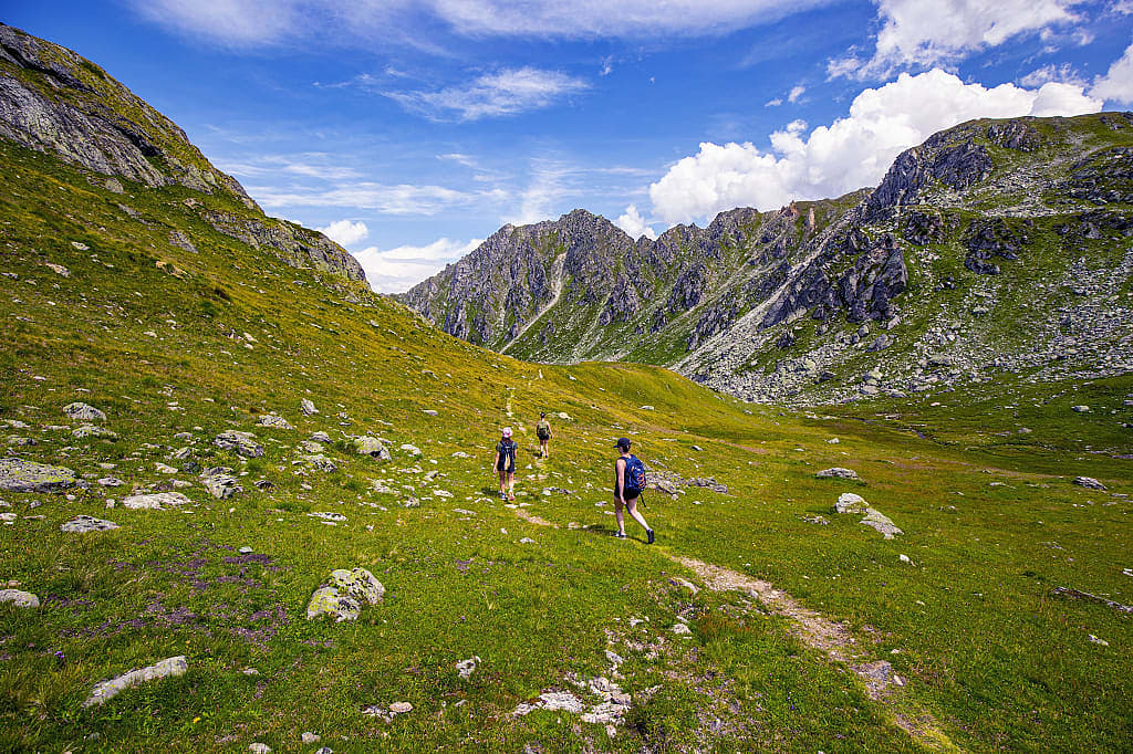 Three young women hiking in Nendaz, Switzerland