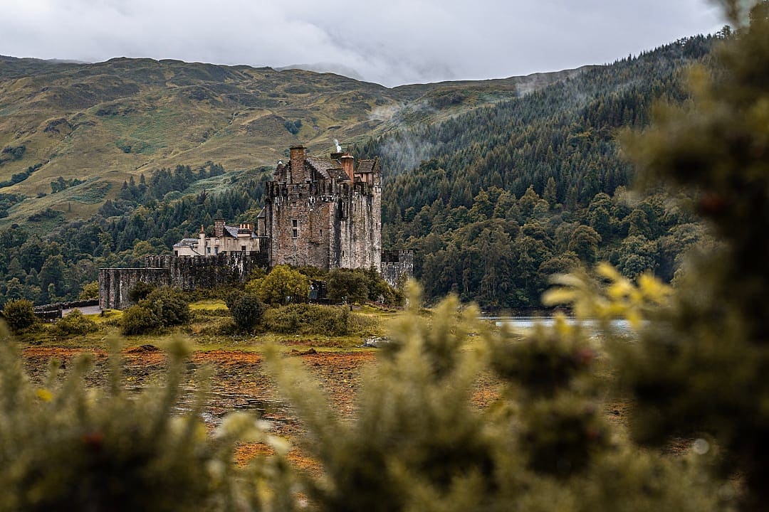 The haunted castle of Eilean Donan, surrounded by mystical waters.