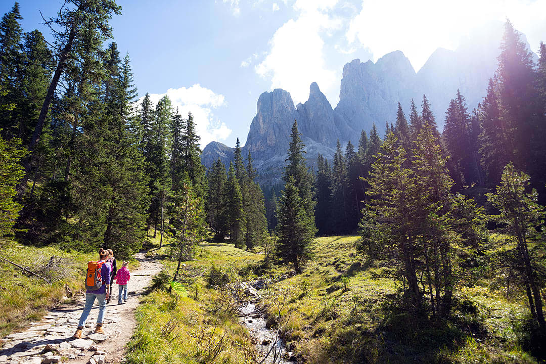 Family hiking at the Puez Odle Nature Park in the Dolomites