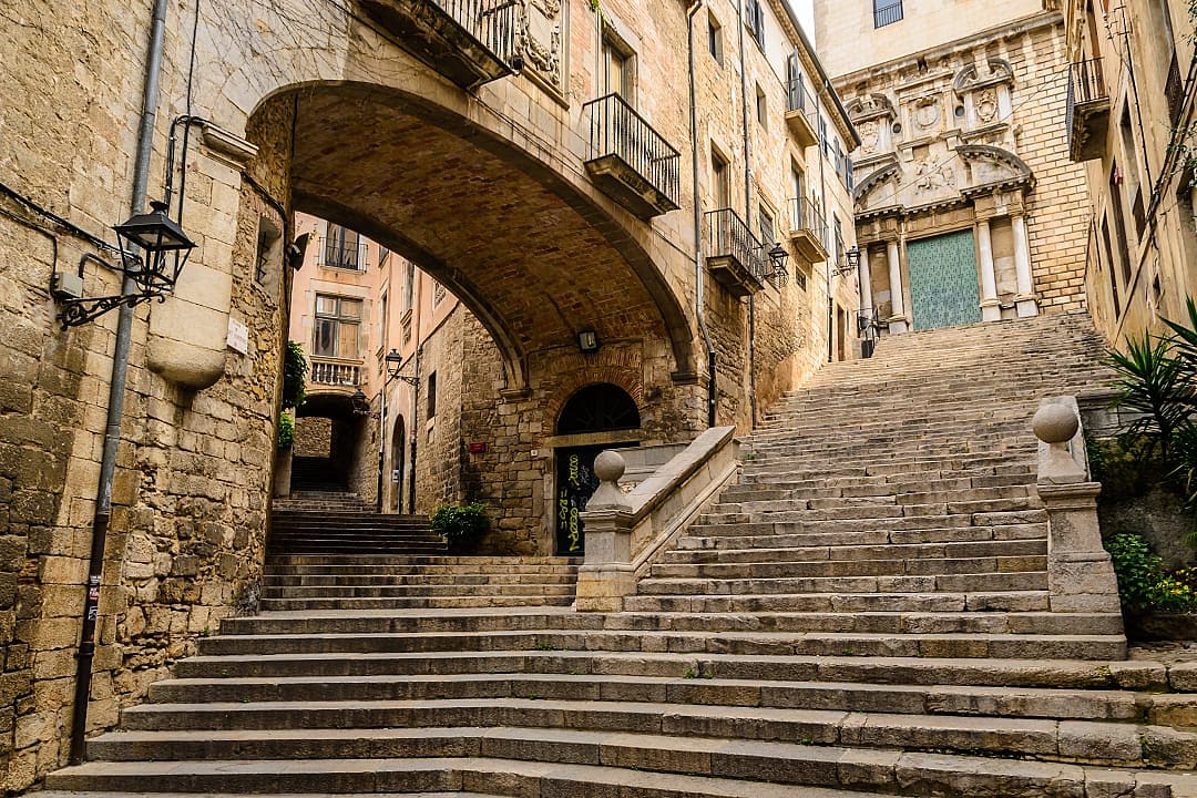 Medieval street in Girona old town, Spain