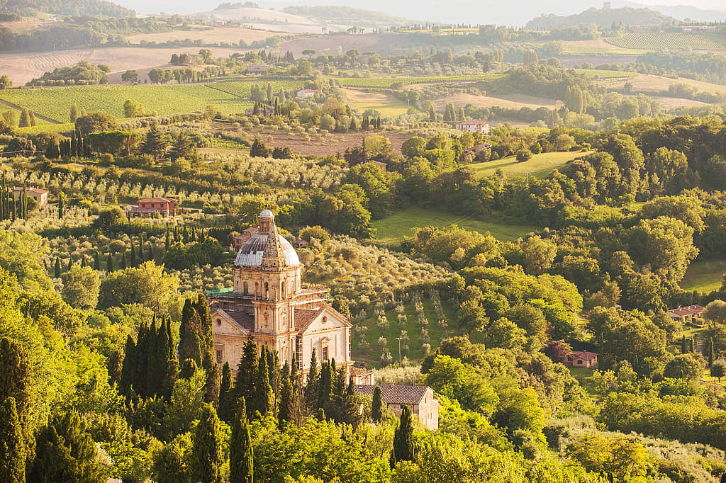 Church of San Biagio in Montepulciano surrounded by Tuscan countryside