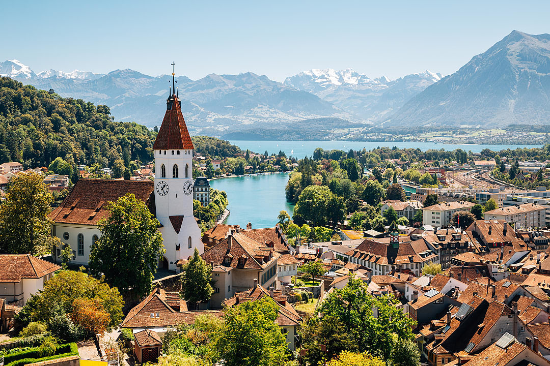 Thun cityscape with Alps mountains and lake