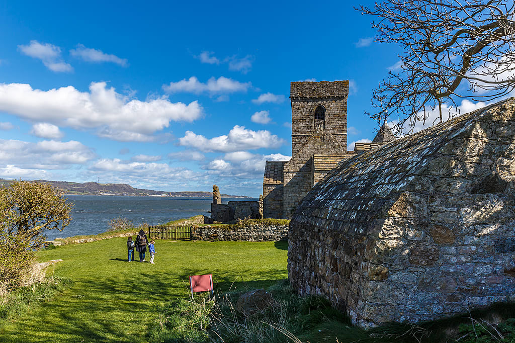 Mother with two kids at Inchcolm Abbey on the Island of Inchcolm, Scotland
