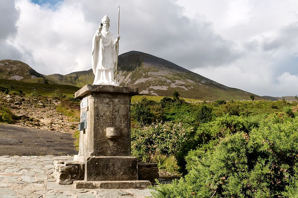 Sacred Mount Croagh Patrick and Statue of St. Patrick, Westport, County Mayo, Ireland.