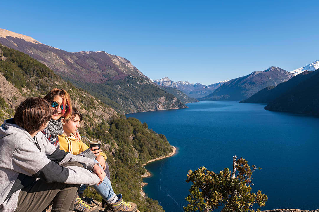 Family enjoying the view in the lake district of Argentina