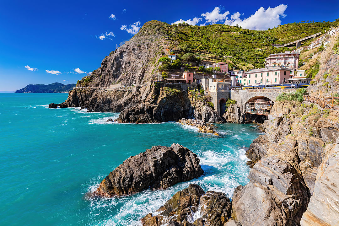 Train crossing the Ligurian coastline, Italy