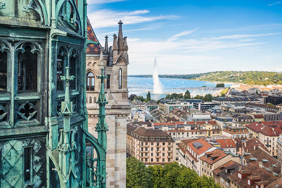 View of Geneva and jet d’eau fountain from height of the Cathedral of Saint Pierre