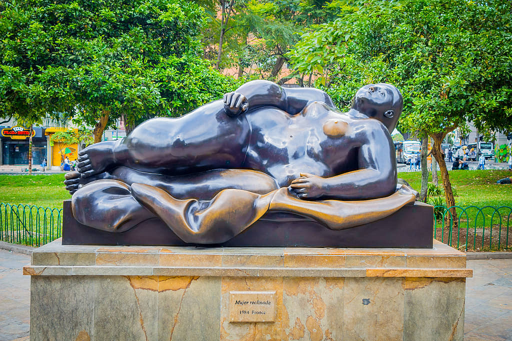 Mujer reclinada (Woman reclining) by Fernando Botero at Plazoleta de las Esculturas in Medellin, Colombia