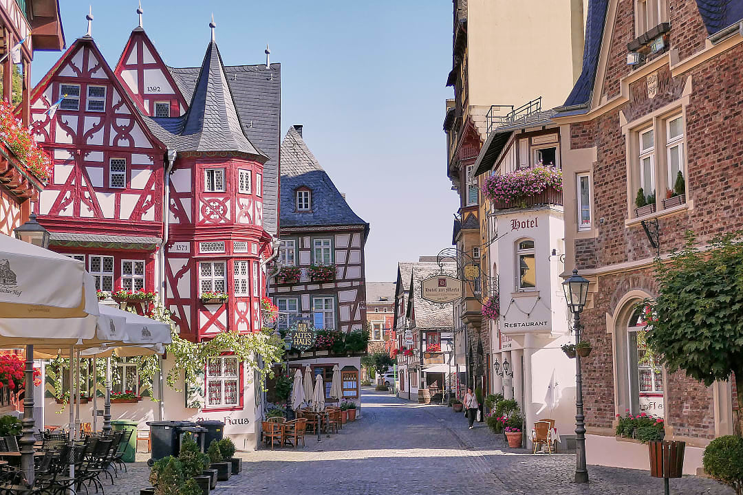 Charming cobblestone street lined with half-timbered buildings in the old town of Bernkastel-Kues, Germany