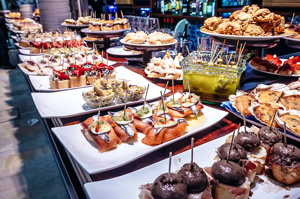 Pinchos on display at tapas bar in San Sebastian, Spain