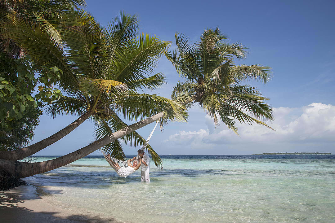 Couple at the beach in The Maldives.