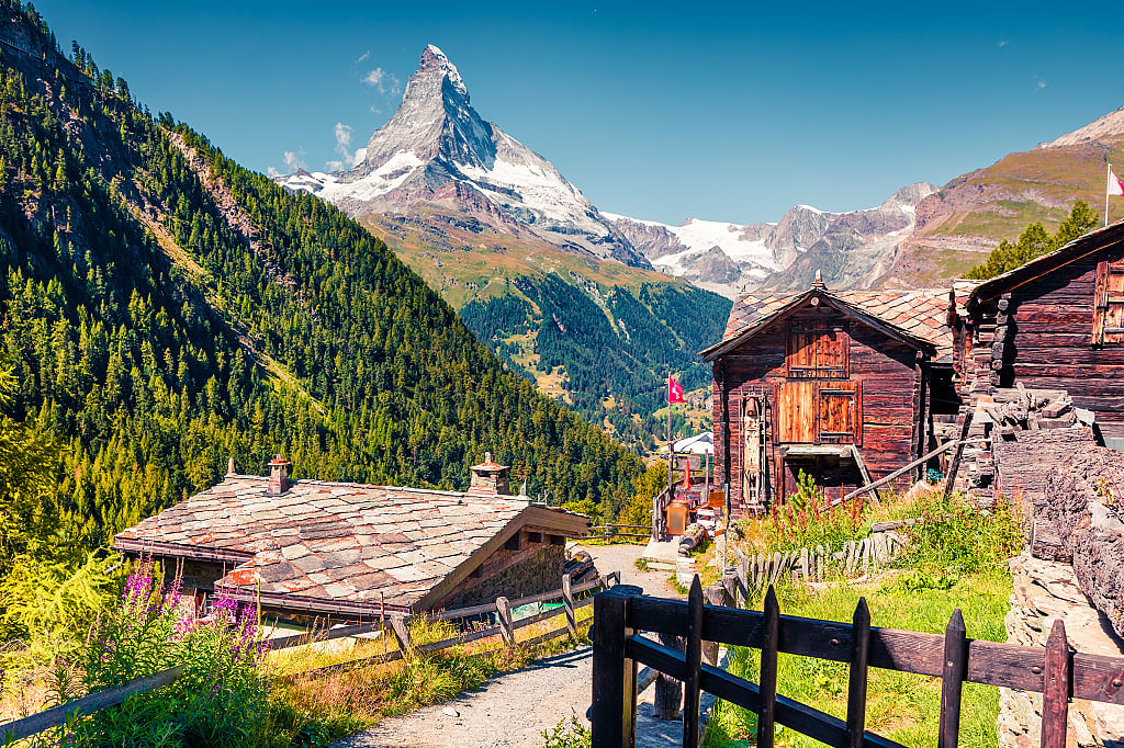 Sunny summer morning in Zermatt village with Matterhorn