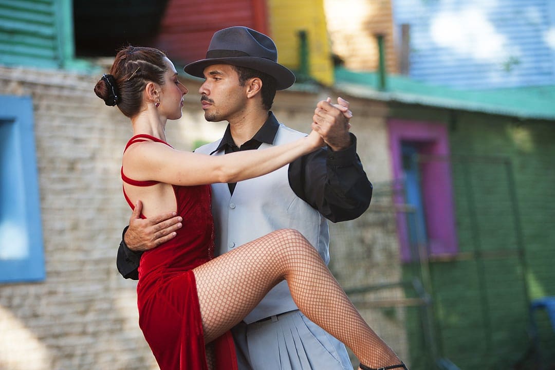 Couple dancing the tango in the La Boca neighborhood of Buenos Aires, Argentina