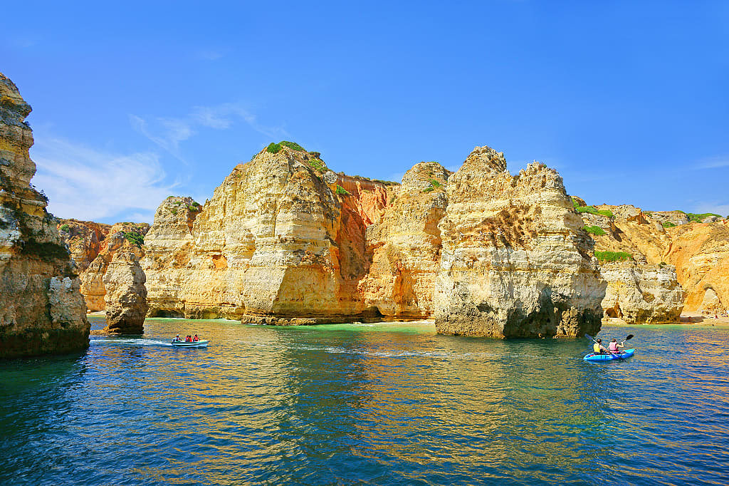Kayaking around the caves at Ponte de Piedade in Algarve, Portugal.