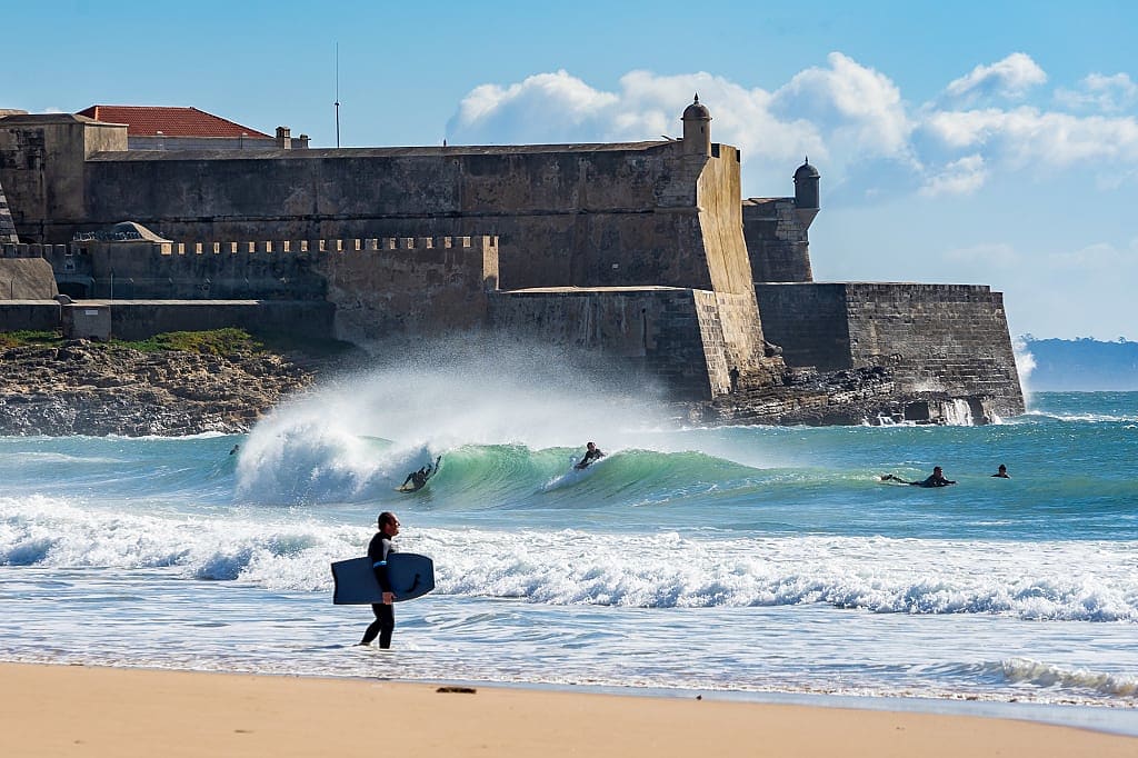 Body boarding and surfing in Carcavelos, Portugal