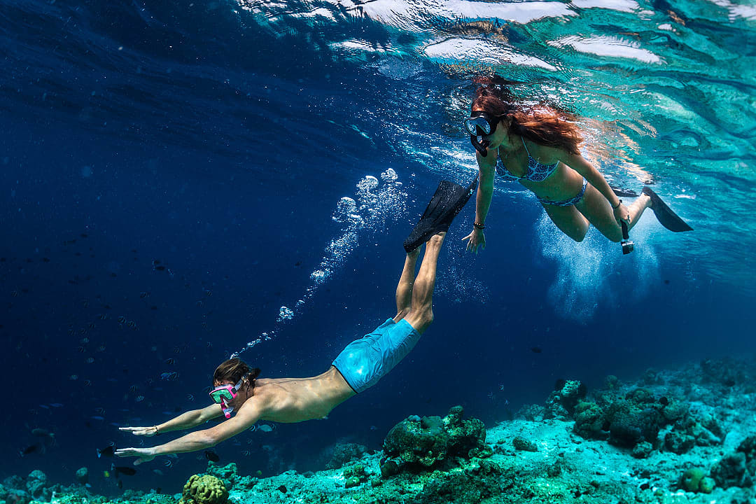 Couple snorkeling in the Maldives