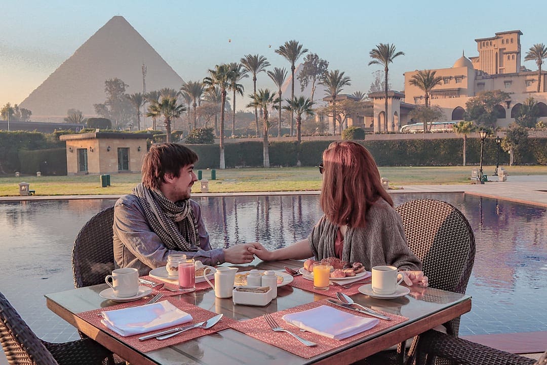 Romantic breakfast with view of the Great Pyramid of Giza in Egypt