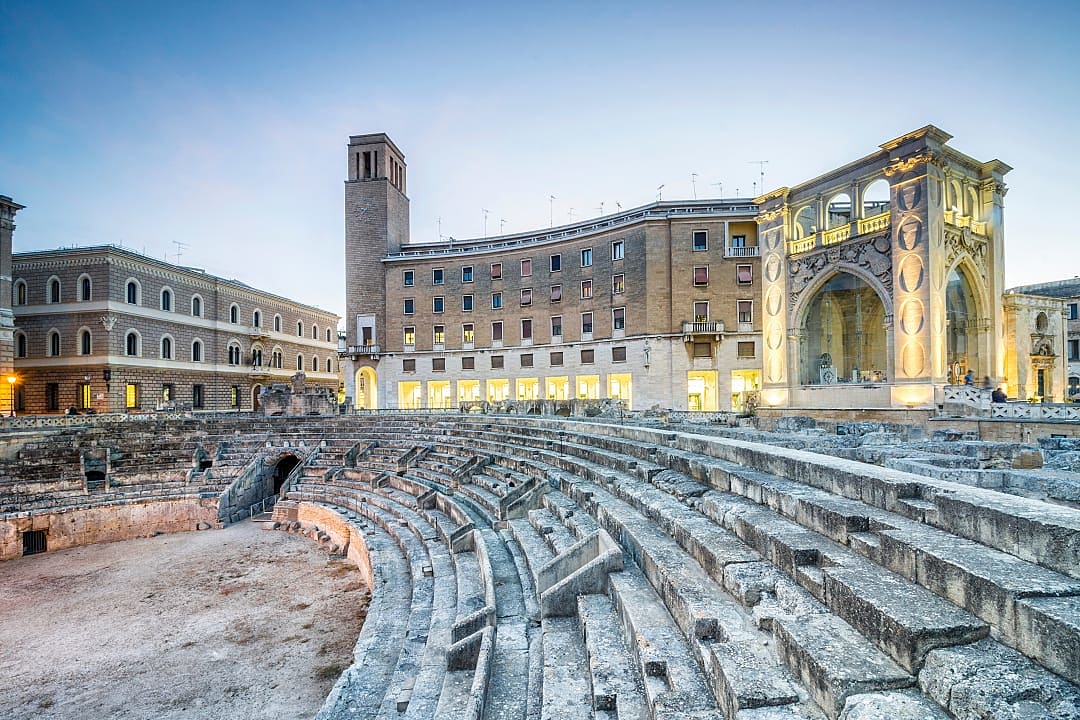 Ancient amphitheater in Lecce, Italy at sunset