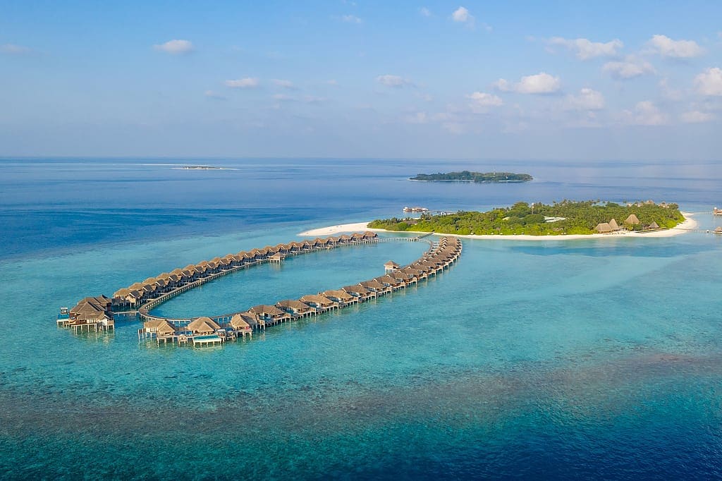 Over water villas at Anantara Kihavah Maldives in the Baa Atoll