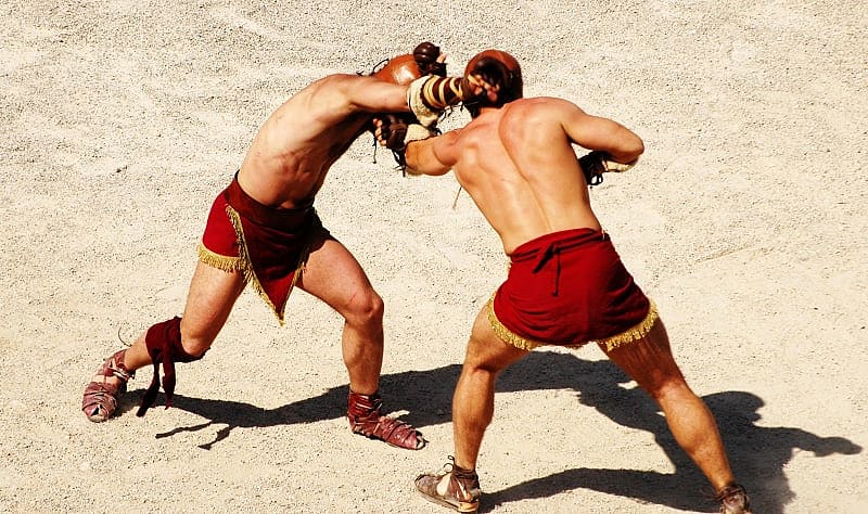 Two gladiators fighting.
