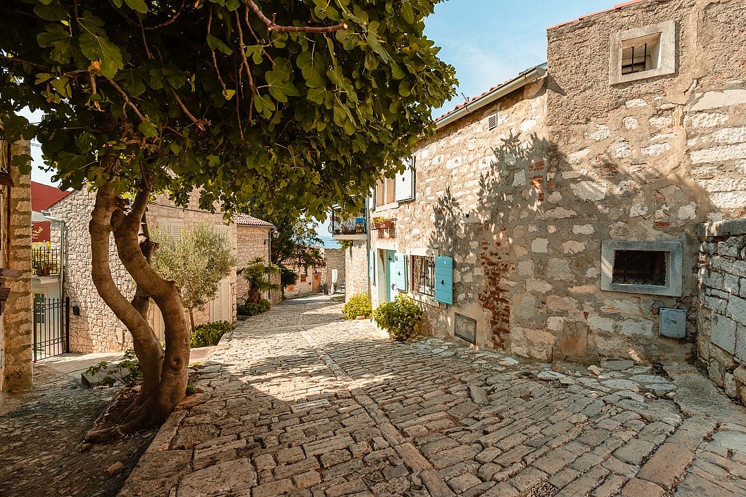 The medieval village in Rovinj, Croatia, features charming stone streets and houses.