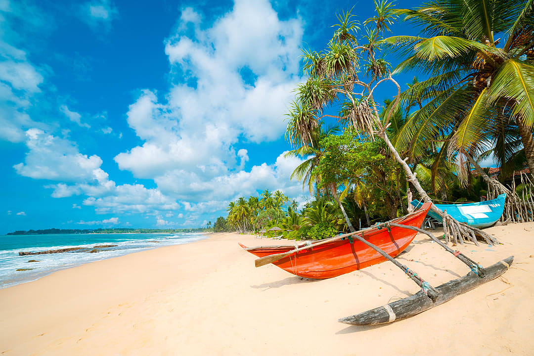 Fishing boats on a beach in Sri Lanka