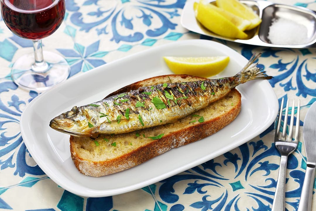 Traditional Portuguese grilled sardines.