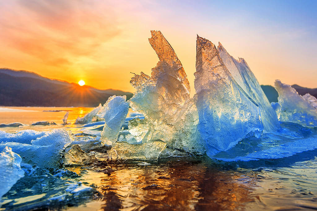 Very large and beautiful chunk of ice at sunrise in winter., Iceland