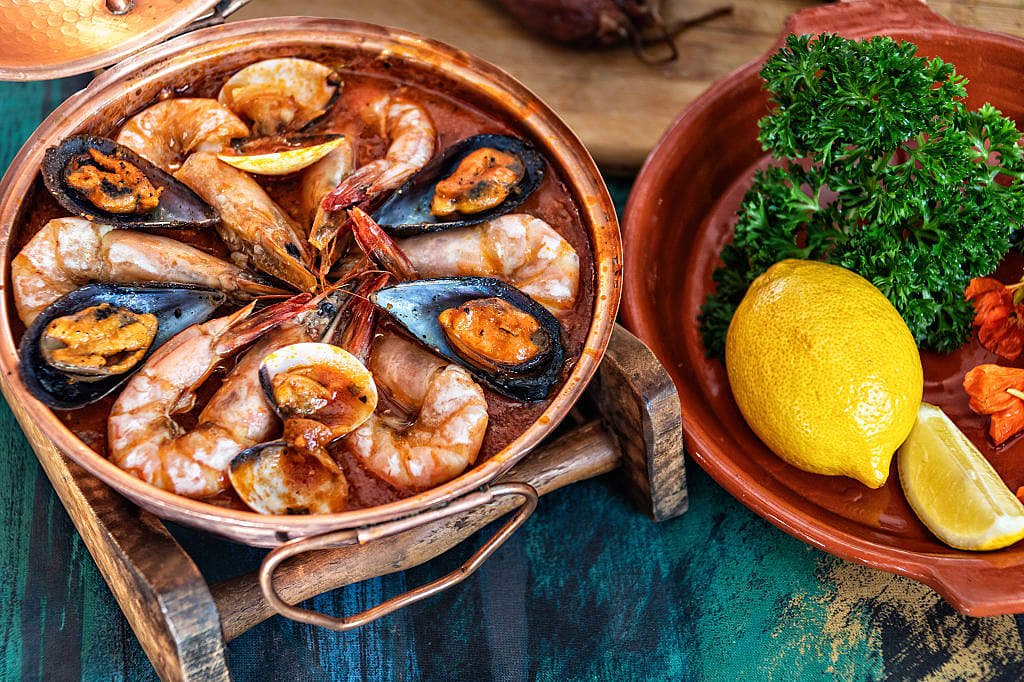 Seafood Cataplana, traditional Portuguese stew served in the Algarve region of Portugal