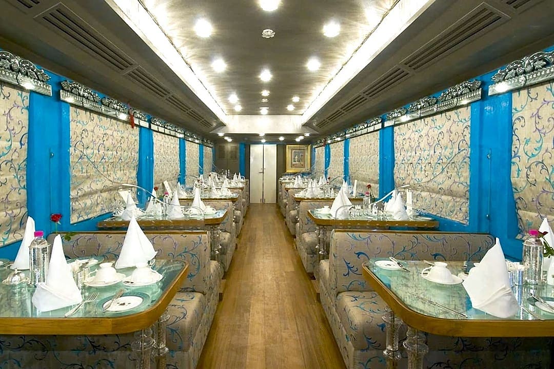 Elegant train dining on, The Palace on Wheels.